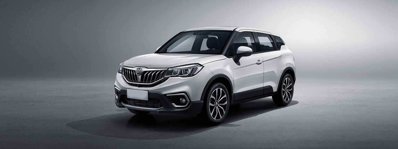White Brilliance SUV viewed from the front and side
