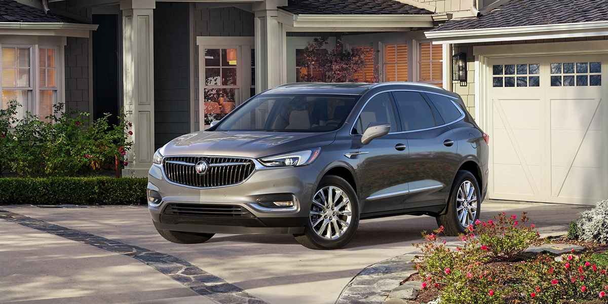 Buick Enclave parked outside a home