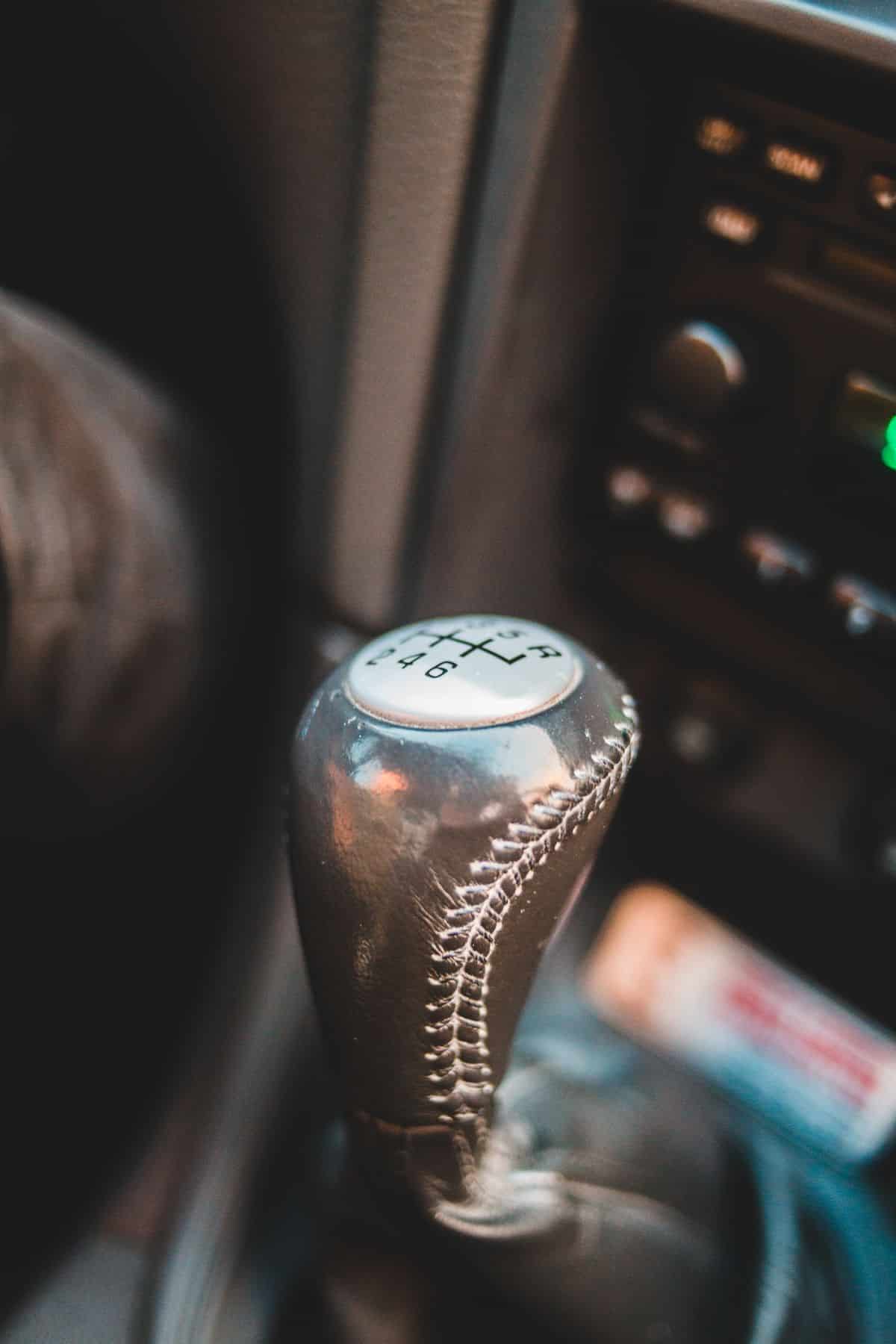 Six speed manual gear selector inside a car