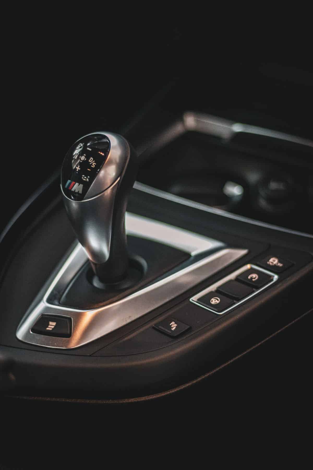 Automatic gear selector and center console inside a car
