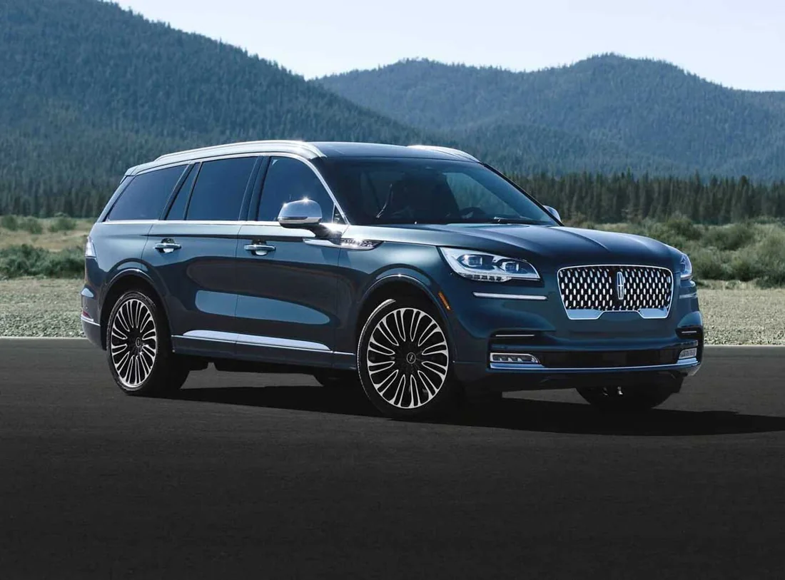 Lincoln Aviator SUV parked beside a mountain road