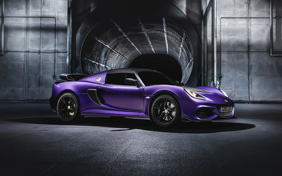 Purple Lotus sports car showing low ground clearance