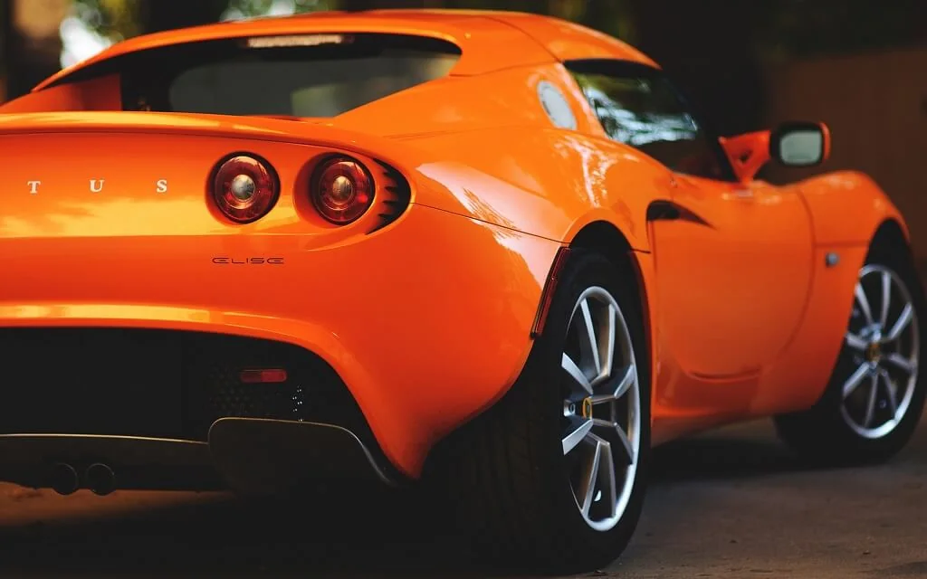 Orange Lotus Evora viewed from the rear quarter