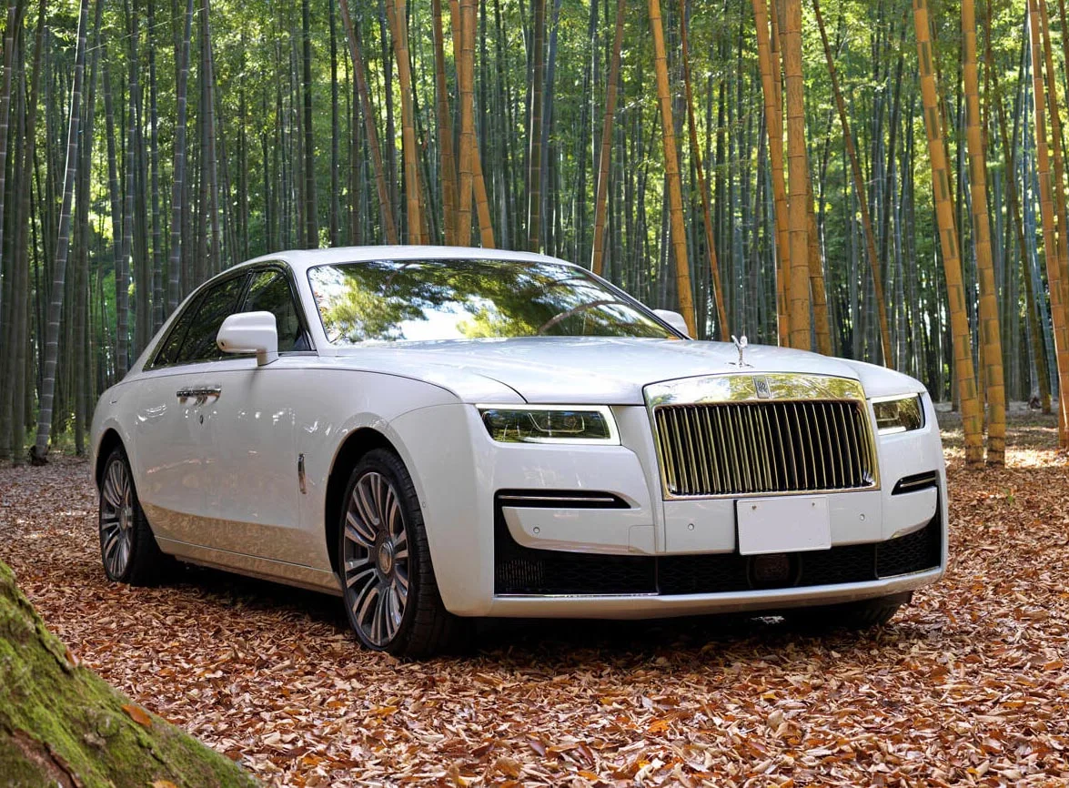 White Rolls-Royce Ghost viewed from the front and side