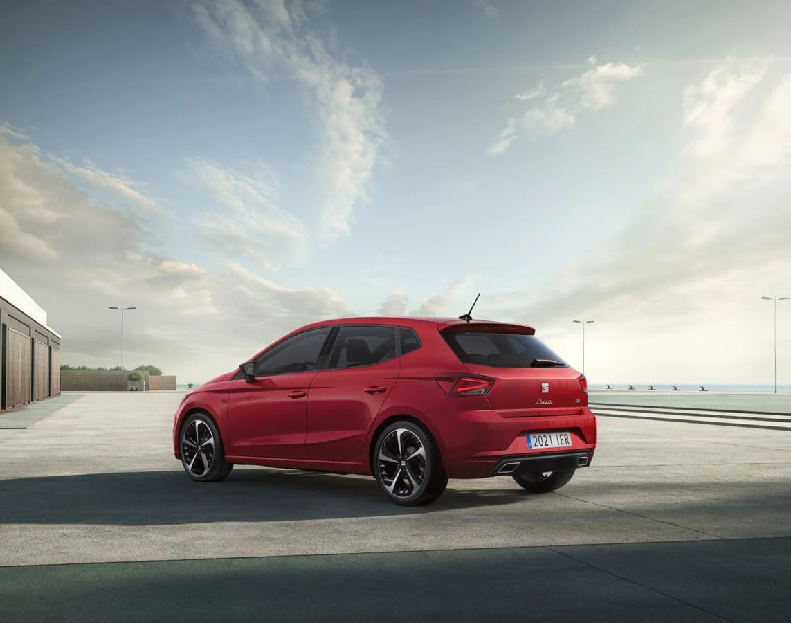 Red SEAT Ibiza viewed from the rear quarter