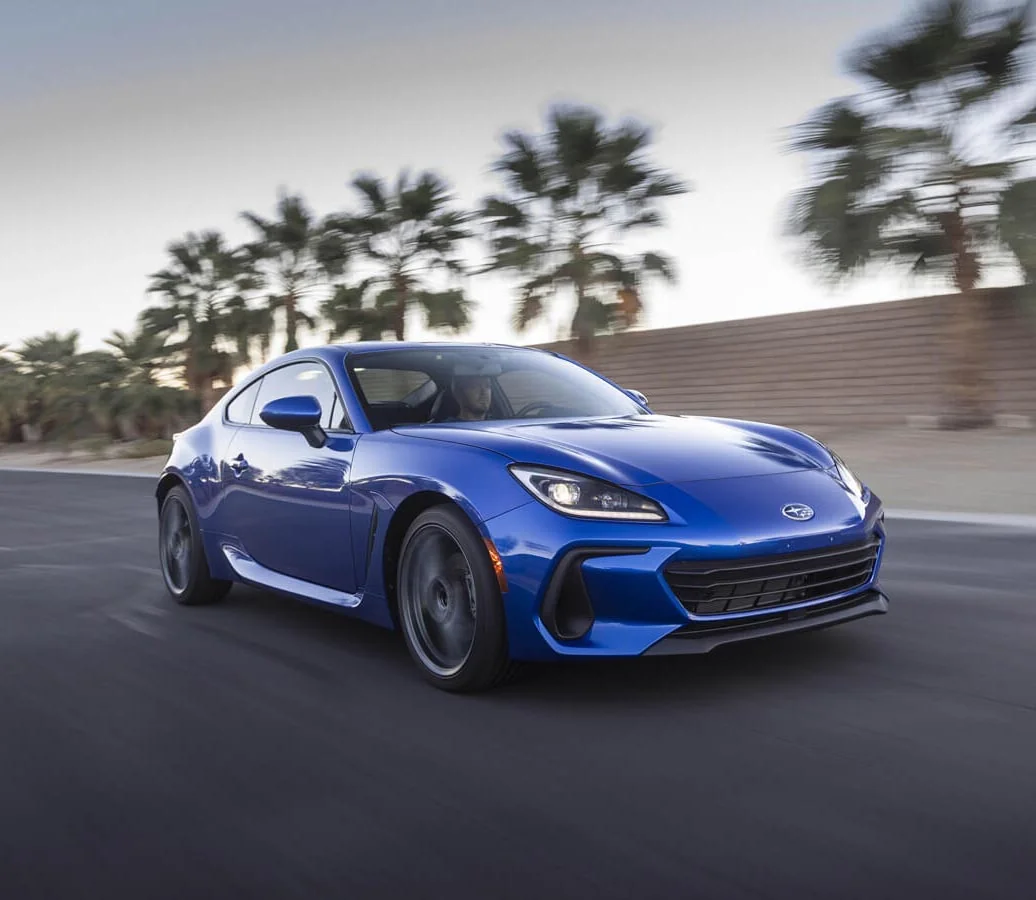 Blue Subaru BRZ viewed from the front and side